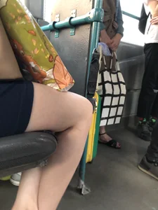 Hot Legs of a Stocky Girl in a Skirt Sitting in a Bus Creepshot Closeup