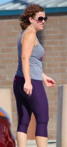 Milf with a nice ass in tight purple leggings