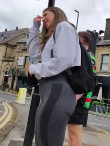 Brunette girl in grey leggings