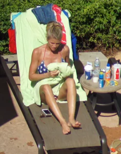 Blonde babe at the pool with sexy body in USA bikini