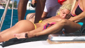 Big booty blonde babes on the beach in little thong bikinis
