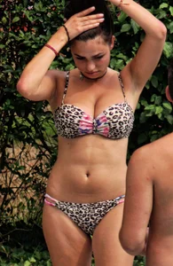Hot big boobed girl in bikini at the pool