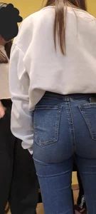 Girl is showing her blue jeans