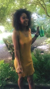 Cute girl in a dress laughing