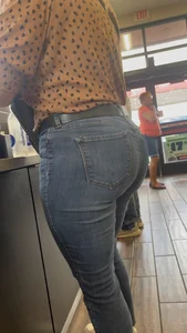 Pawg blonde filling out jeans. Slight VPL