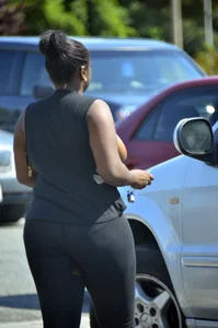 Chubby black lady with big tits and no bra lets it slip