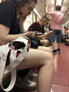 Cute Girl With Nice Legs in the Subway Train Candid Pics Gallery