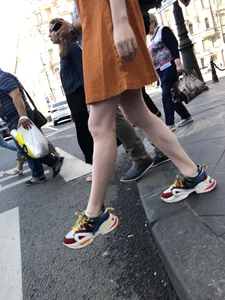 Cute Teen Girl in a Dress With Slim Legs Standing in the Subway Train, Then Crossing the Street Photo Gallery