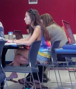 College girl in class showing sideboob with no bra on