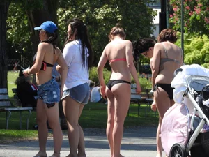 Group of sexy girls in bikinis at the beach