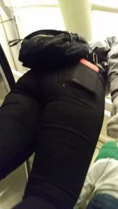 Girl in Black Pants on the Escalator with Spread Legs Creepshot