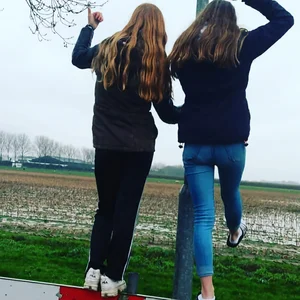Bunch of teens in shorts and skinny jeans hanging around