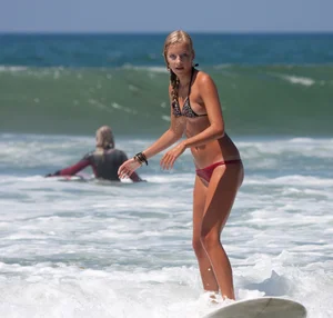 Candid surfer babes on the beach and in bikinis