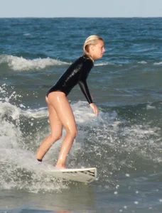 Hot surfer chicks out in the water