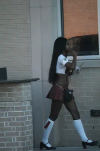 Sexy ebony Tilted Kilt employee in her uniform