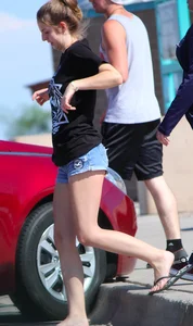 Candid skinny college girl in denim shorts showing some cheeks