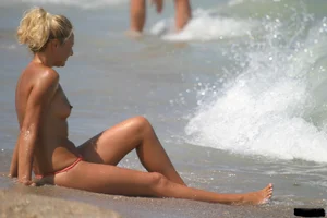A bunch of sexy beach voyeur babes in bikinis, thongs and topless