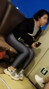 A Young Candid Girl in Glistening Tights in the Public Train Creepshots
