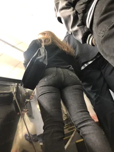 Juicy Booty in Tight Grey Jeans Low Angle Closeups on the Subway Escalator