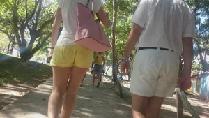 Milf in yellow shorts with vpl and a wedgie
