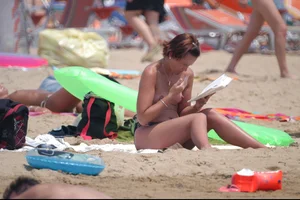 Girls on a nude beach in Bibione, Italy