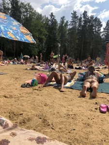 Sexy Tattooed Girls in Swimsuits Lying on a Beach Creepshots
