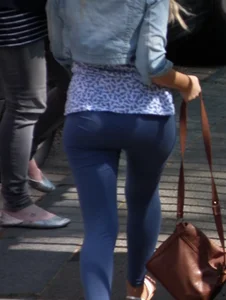 Hot blonde girl in tight blue leggings with nice ass