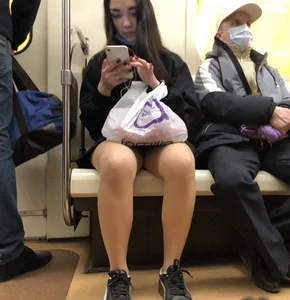 Hot Girl in Pantyhose And a Skirt Creepshots Gallery in a Subway Train and on an Escalator