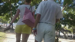 Milf in yellow shorts with vpl and a wedgie