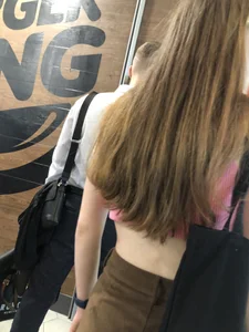 Extremely cute teen in a fast food restaurant