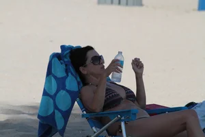 Big collection of various sexy girls on a beach in bikinis