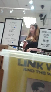 Girl at the record store in shorts with a nice booty and vpl