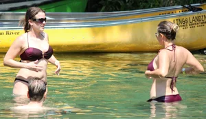 Two big boobed bikini babes in maroon bikinis