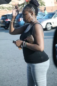 Ebony milf out shopping in grey leggings