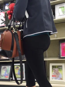 Sexy lady shopping at Walmart in leggings