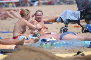 Girls on a nude beach in Bibione, Italy