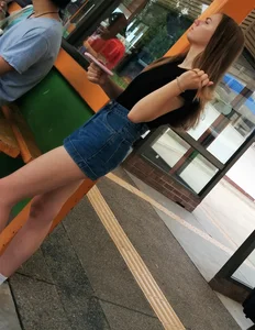 Tall Candid Girl With Long Skinny Legs in a Denim Skirt