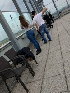 Big sexy ass in tight jeans at the airport