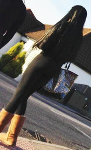 2 sexy black girls in leggings with nice asses