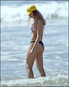 Two hot and sexy girls on the beach in thongs with incredible asses