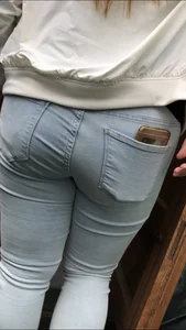 Fat ass in light jeans