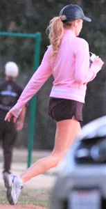 Beautiful skinny girl out for a walk in little shorts