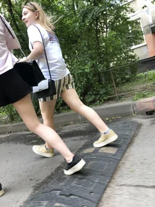 Couple of candid teens walking down the street