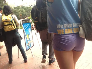 Flat Teen Ass in Purple Mini Shorts on the Street
