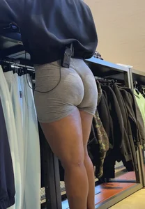 Nike employee in grey shorts with a massive wedgie