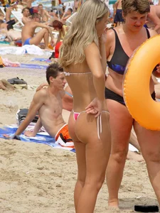 Beach voyeur girls in bikinis, thongs and topless