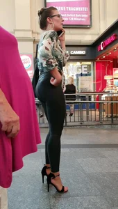 Candid classy and sexy lady with a great ass in tight wet look leggings and heels