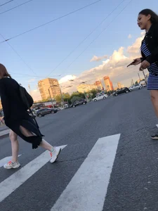 Teen wearing black dress which becomes transparent