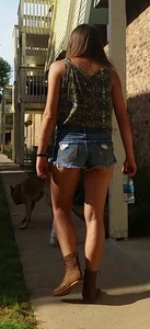 Cute friend in denim shorts showing some cheek