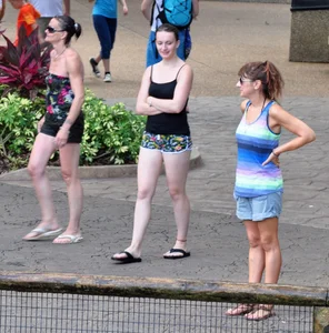 Couple of cute girls in wet shorts with decent asses